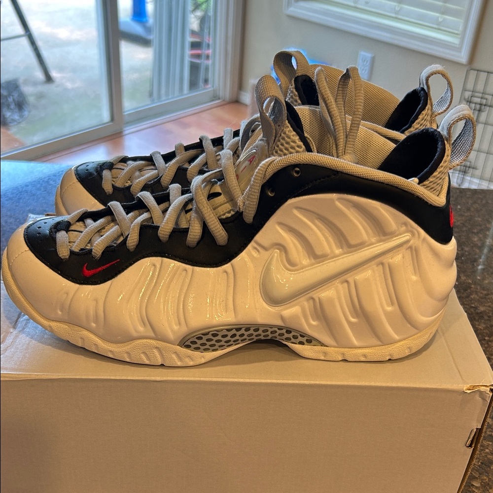 Men Foamposite Nike White and Black Foamposite Sneakers with Red Accents